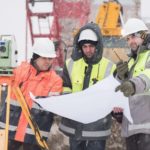 Civil Engineers At Construction Site In Winter Civil Engineers At Construction Site In Winter